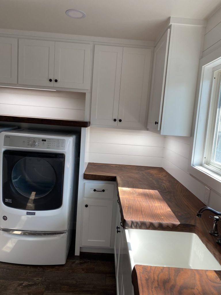 Incredible Laundry Room Renovation Using Claro Walnut Slab Countertops